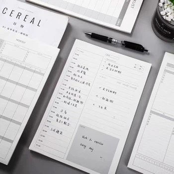 Практичен откъсване на бележник за водене на записки на масата и седмичен график продуктивни работни дни